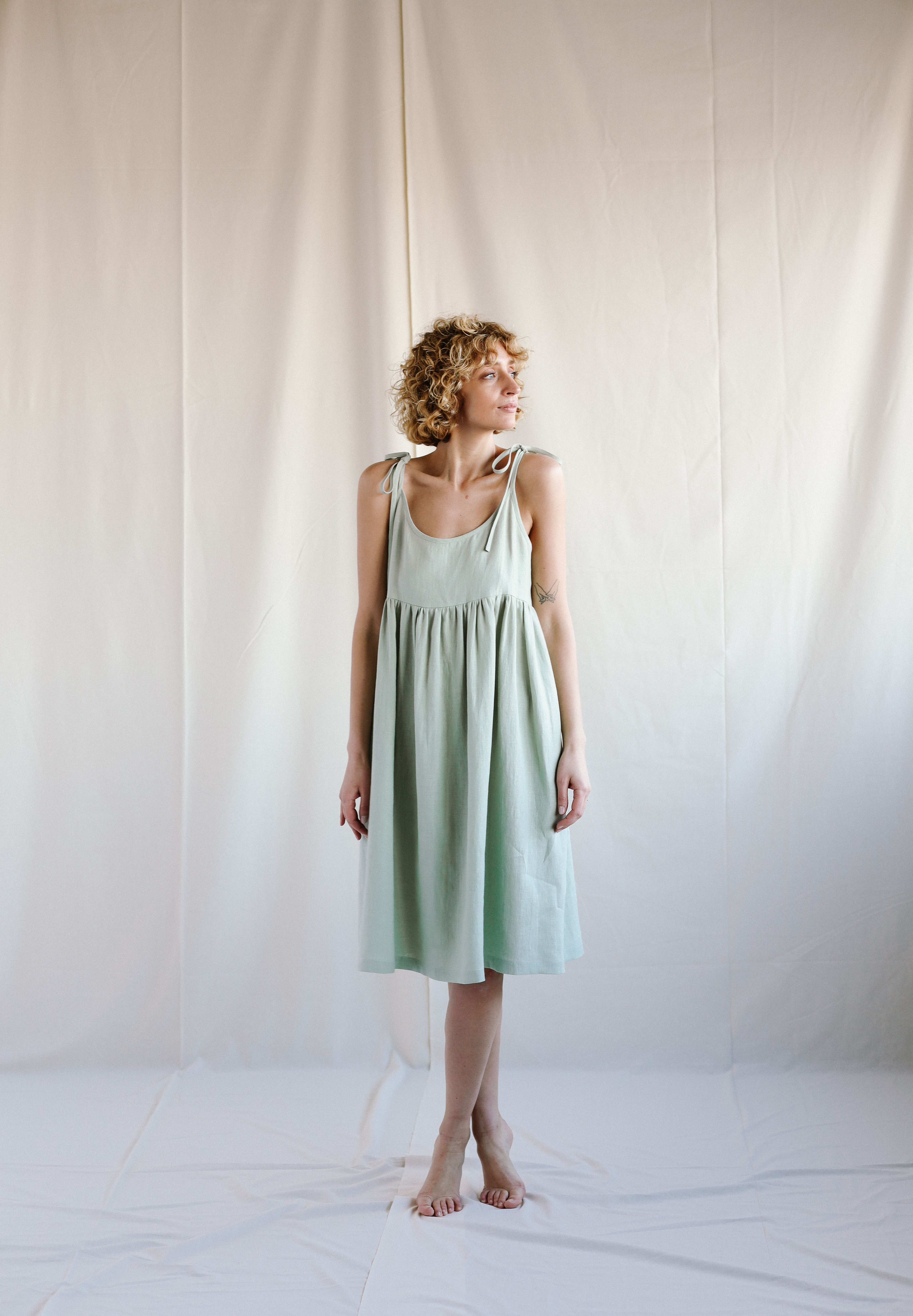 sage green linen dress Loose in color – OffOn Fit Please review the siz to e Why This dress blends minima DIORA Linen Slip Dress