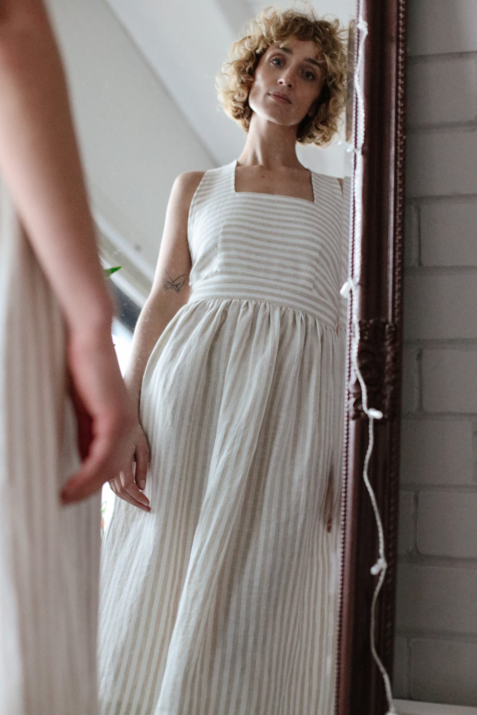 linen apron dress with Pockets in Yard Dye Stripe Silver Stripe / One size Available colours include olive green checkered and denim blue stripes Blue Linen Midi Apron Dress
