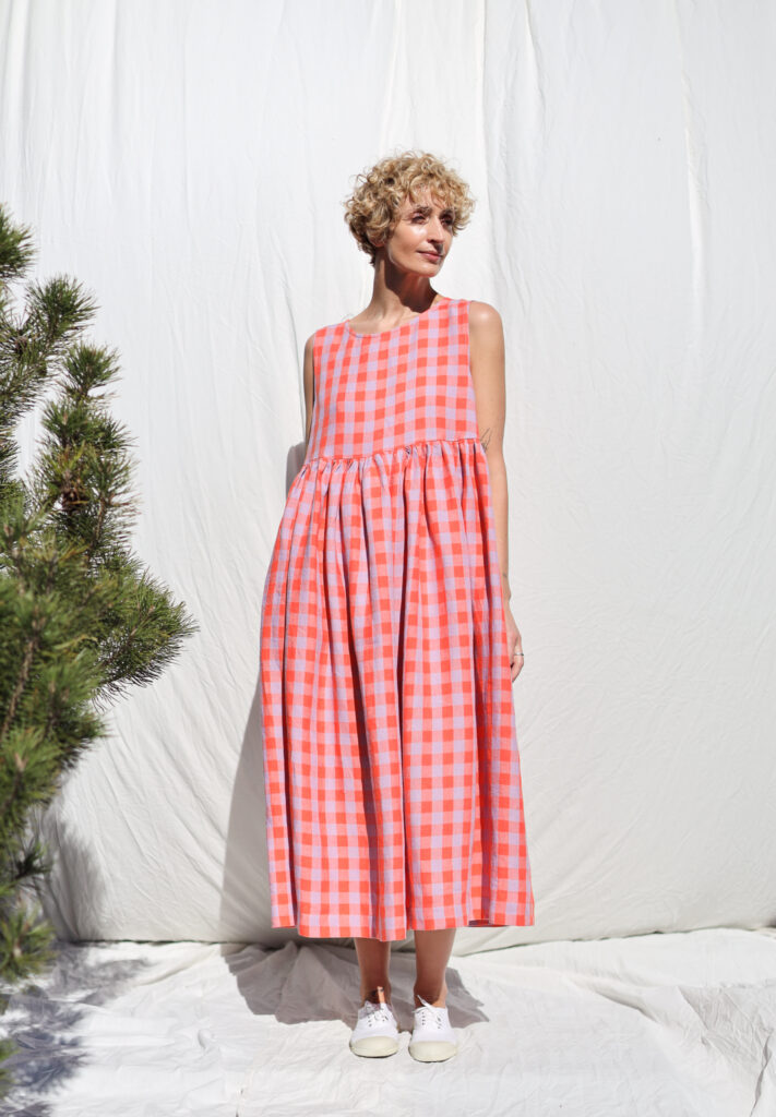 Sleeveless linen smock dress in pink checks - Image 1
