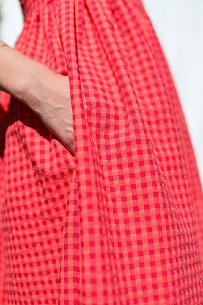 Sleeveless smock dress in glace cherry red seersucker checks - Image 5