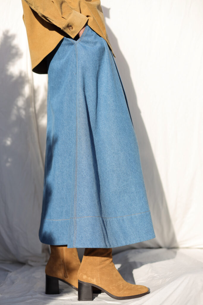 A-line full skirt with front pleats in light blue denim - Image 1
