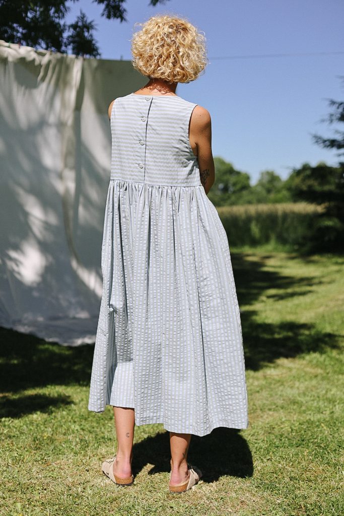 Sleeveless smock dress in seersucker stripes