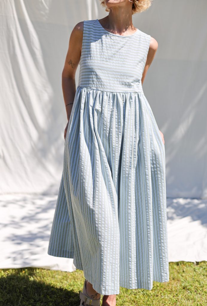 Sleeveless smock dress in seersucker stripes
