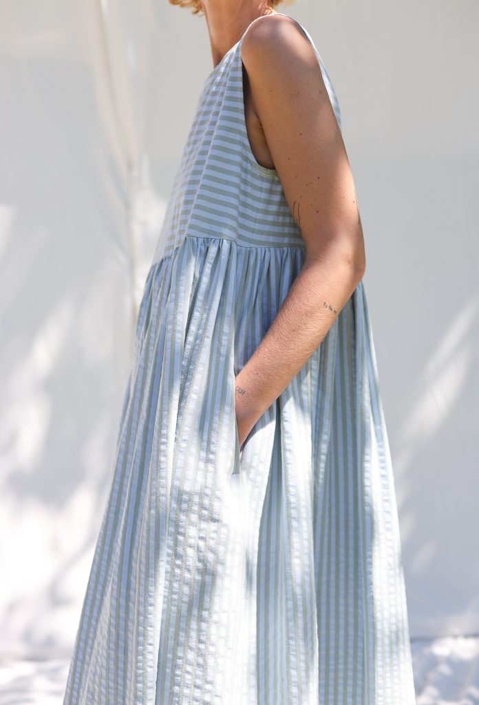 Sleeveless smock dress in seersucker stripes