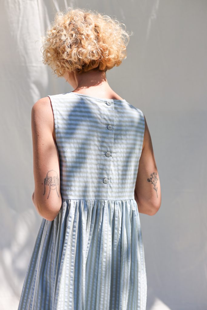 Sleeveless smock dress in seersucker stripes
