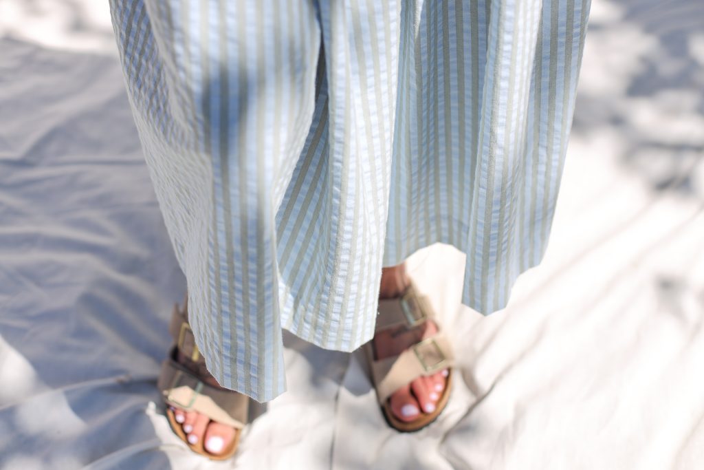 Sleeveless smock dress in seersucker stripes