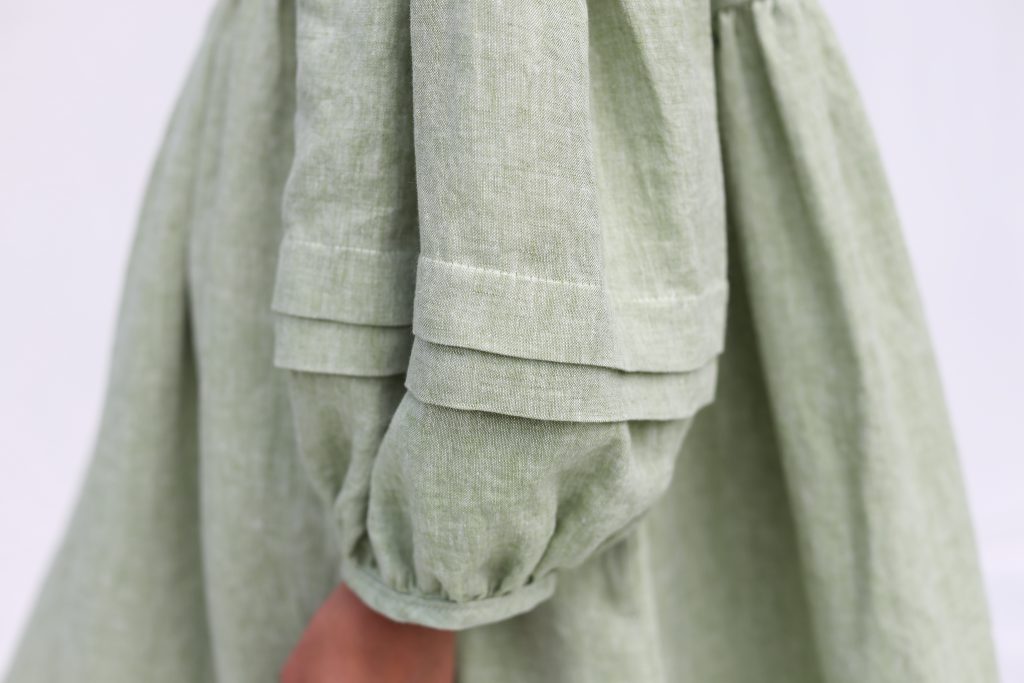 Oversized Linen Dress with Pleated Details in Leaf Green Melange